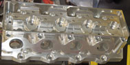 2012 – 5 inch bore spacing billet symmetrical port turbocharged and supercharged wedge head