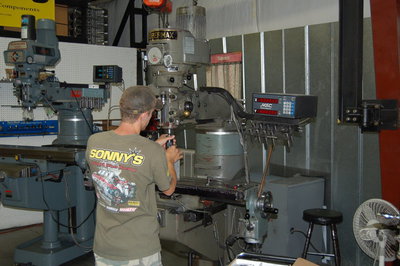 Rick is shown here, setting machine up for gas porting pistons