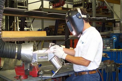 Randy fabricating one of Sonny's custom sheetmetal intakes. Our welding and fabrication shop is second to none making the very best manifolds in the industry today.