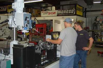 Chuck and Eric balancing crankshaft